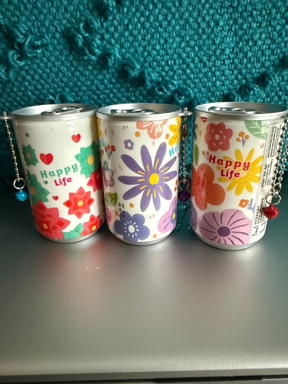 Set of Three Happy Life Floral Mini Can Charm - Multi Color. NWOT.